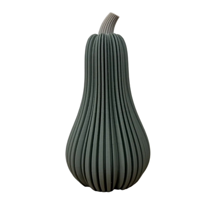 3D-geprinte decoratieve 
flespompoen in muted green met geribbelde structuur.